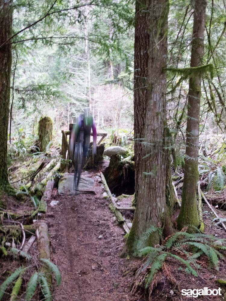 Brett hitting the first drop on Roadside Attraction. The trail is mostly decrepit, but this first hit is still fun.